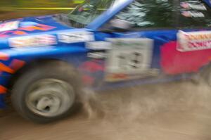 Tim Penasack / Scott Putnam blast through a left-hander on the press stage in their Subaru WRX.