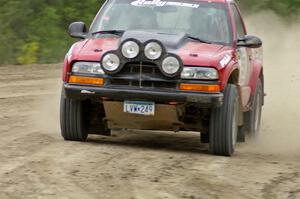 Jim Cox / Brent Carlson Chevy S-10 rockets through the high bank on SS1 at Bemidji Speedway.