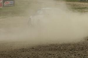 Paul Ritchie / Drew Ritchie Mitsubishi Eclipse GSX in shrouded by a cloud of dust on SS1.