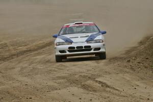 Paul Ritchie / Drew Ritchie Mitsubishi Eclipse GSX comes into the finish of SS1.