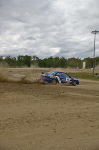 Kazimierz Pudelek / Mariusz Malik Subaru Impreza corner hard on the SS1 super special stage at Bemidji Speedway.