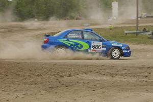 Heath Nunnemacher / Heidi Nunnemacher Subaru WRX enters the infield on SS1 at the Bemidji Speedway.