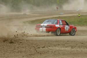 Mark Utecht / Rob Bohn Ford Mustang slings mud at the Bemidji Speedway Super Special, SS 1.