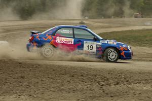 Tim Penasack / Scott Putnam Subaru WRX head into the Bemidji Speedway infield section on SS1.