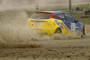 Kyle Sarasin / Mikael Johansson Ford Focus SVT enters the infield at the Bemidji Speedway Super Special, SS1.
