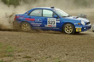 Travis Hanson / Terry Hanson Subaru WRX at speed on SS1 at the Bemidji Speedway.