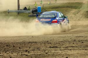 Kenny Bartram / Dennis Hotson Subaru WRX STi blasts gravel at the SS1 Super Special at the Bemidji Speedway.
