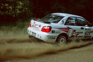 Stephan Verdier / Scott Crouch Subaru WRX on SS2 going into a fast left-hander.