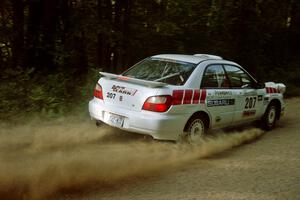 Dave Hintz / John Dillon Subaru WRX at speed on a fast left-hander on SS2.