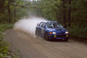 Dmitri Kishkarev / Hugh Hutchinson Mitsubishi Lancer Evo IV on SS2.