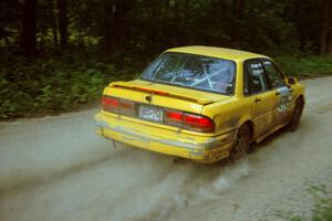 Erik Payeur / Adam Payeur Mitsubishi Galant GSX on SS2. They rolled the car later that day and ended their weekend.