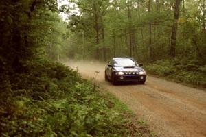 Kazimierz Pudelek / Mariusz Malik Subaru Impreza at speed on SS2.