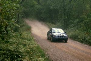 Martin Mennig / Ryan Schnell Subaru Impreza at speed on SS2.