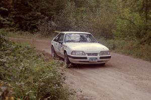 Bob LaFavor / Derek Beyer Ford Mustang comes into the finish of SS2.