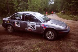 Dan Adamson / Chris Gordon Saturn SL2 at the midpoint of SS3.