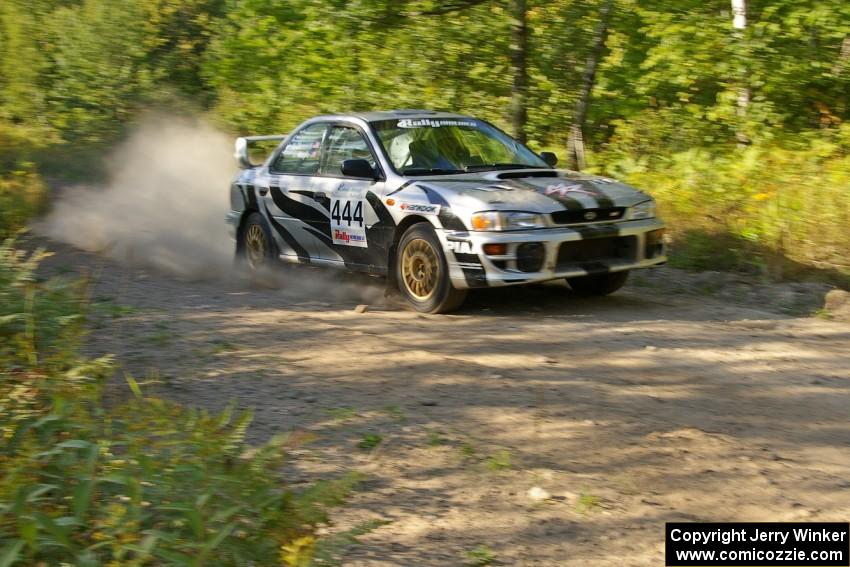 Jeff Moyle / Michael Yarroch Subaru Impreza blasts into a right-hander on the practice stage.