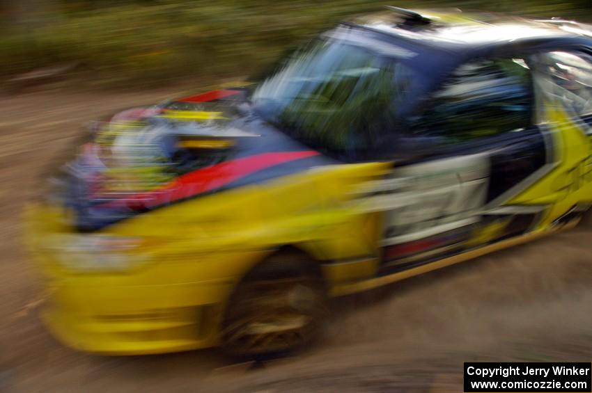 Tanner Foust / Chrissie Beavis Subaru WRX STi on the practice stage.