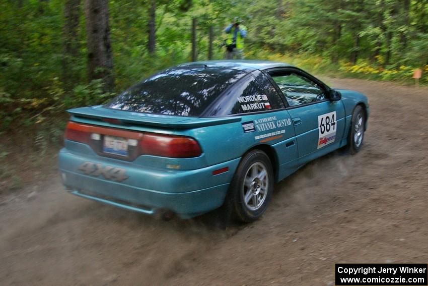 Adam Markut / John Nordlie prepare for a 90-left on the practice stage in their Eagle Talon.