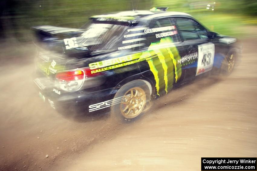 Ken Block / Alex Gelsomino Subaru WRX STi blasts gravel while taking a hard left-hander on the practice stage.