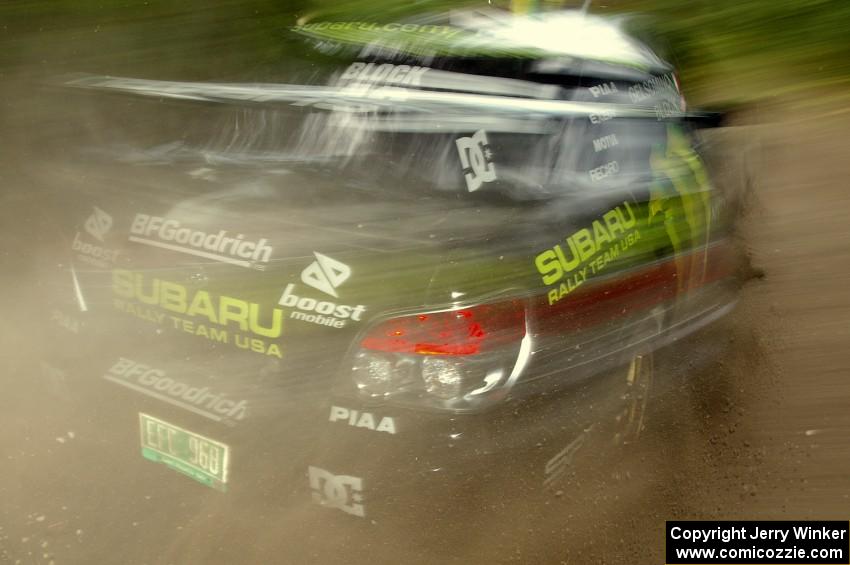 Ken Block / Alex Gelsomino Subaru WRX STi on a hard left-hander on the practice stage.