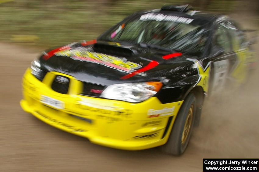 The Andy Pinker / Robbie Durant Subaru Impreza WRX STi on the press stage.