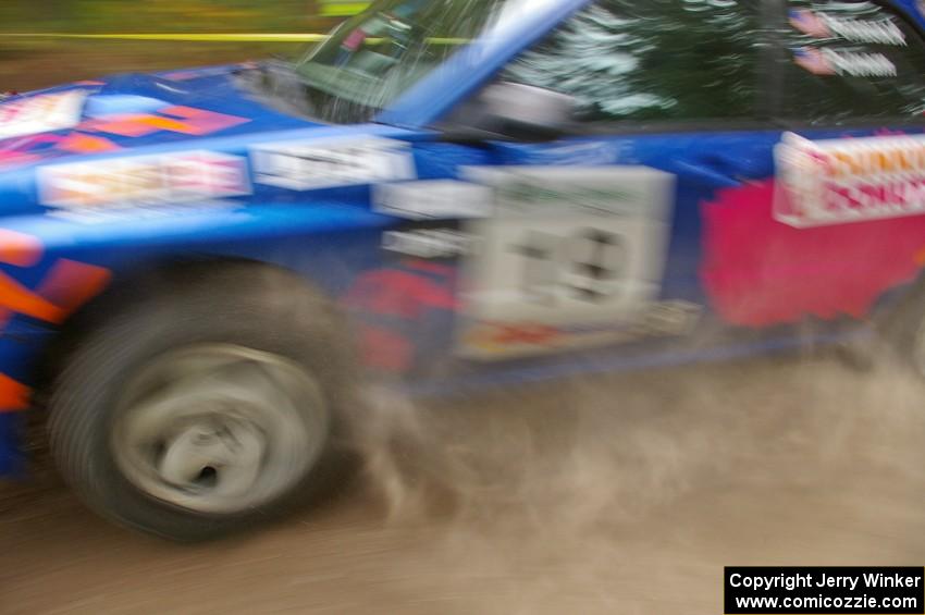 Tim Penasack / Scott Putnam blast through a left-hander on the press stage in their Subaru WRX.