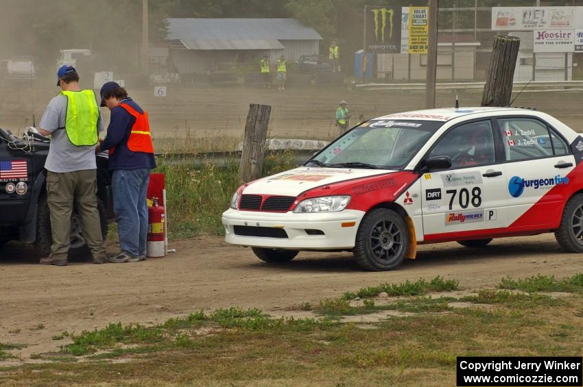 Jan Zedril / Jody Zedril Mitsubishi Lancer ES comes into the finish control of SS1.