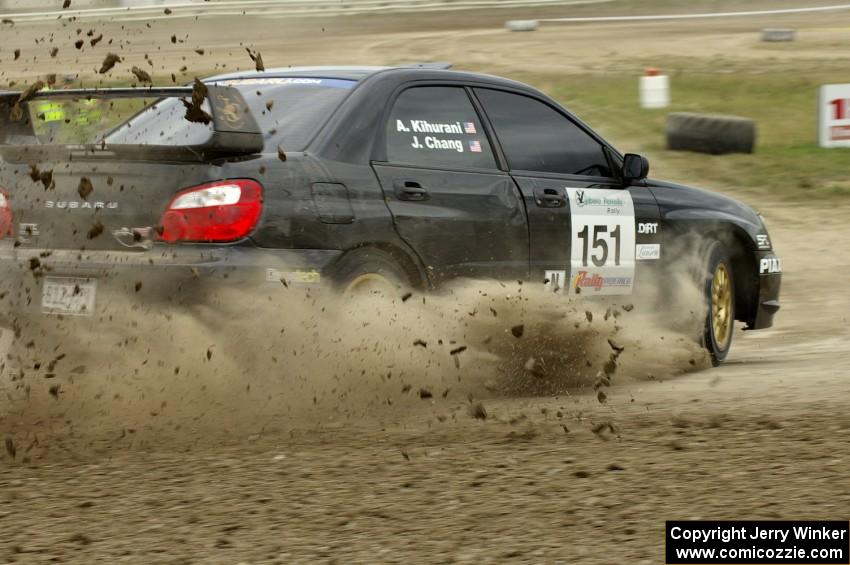 Josh Chang / Alex Kihurani Subaru WRX STi slinging mud on SS1.
