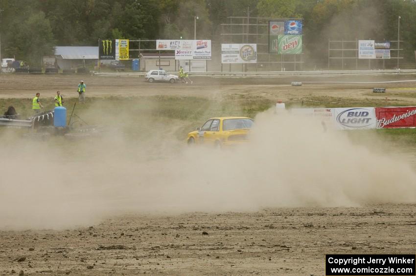 The Erik Payeur / Adam Payeur Mitsubishi Galant GSX slings dirt on SS1.