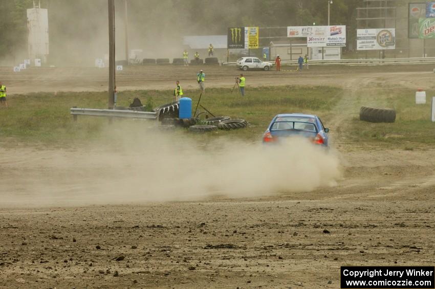 Dmitri Kishkarev / Hugh Hutchinson Mitsubishi Lancer Evo IV on SS1.