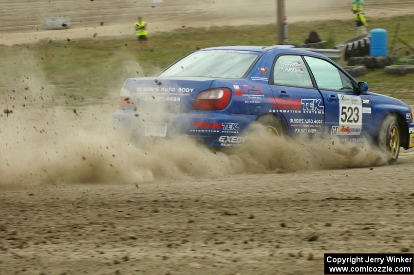 Travis Hanson / Terry Hanson Subaru WRX enters the infield on SS1 at the Bemidji Speedway.