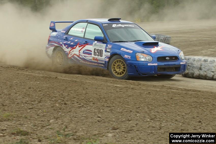 Kenny Bartram / Dennis Hotson Subaru WRX STi slings gravel on SS1 at the Bemidji Speedway.