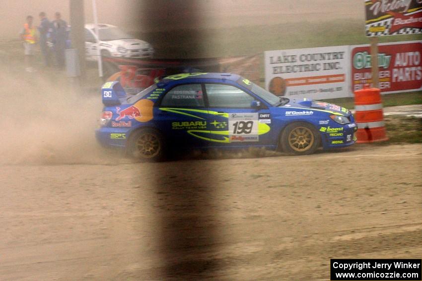 Travis Pastrana / Christian Edstrom Subaru WRX STi at speed on SS1.