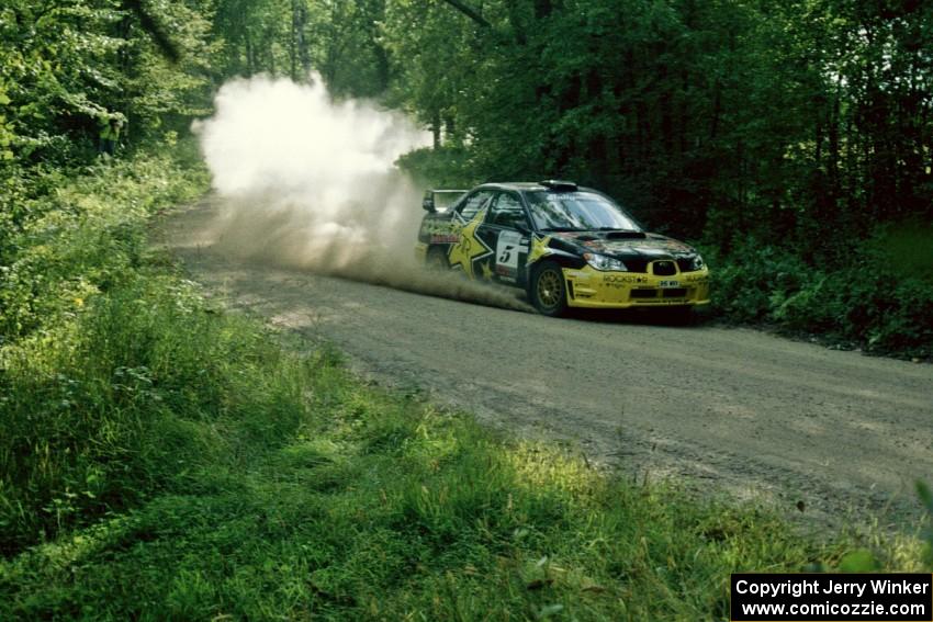 Andy Pinker / Robbie Durant Subaru Impreza WRX STi at speed on SS2 near the finish.