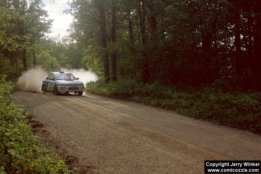 Henry Krolikowski / Cindy Krolikowski Subaru Impreza at speed on SS2.