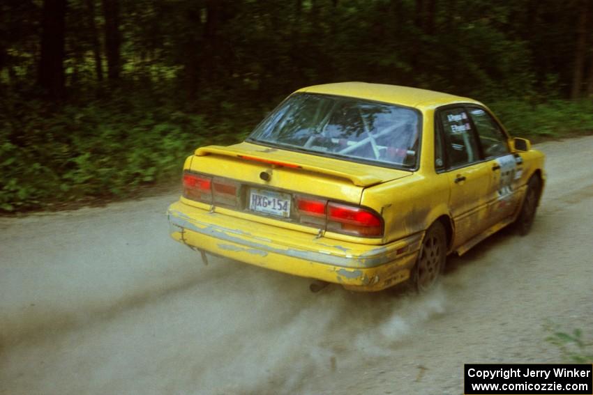 Erik Payeur / Adam Payeur Mitsubishi Galant GSX on SS2. They rolled the car later that day and ended their weekend.