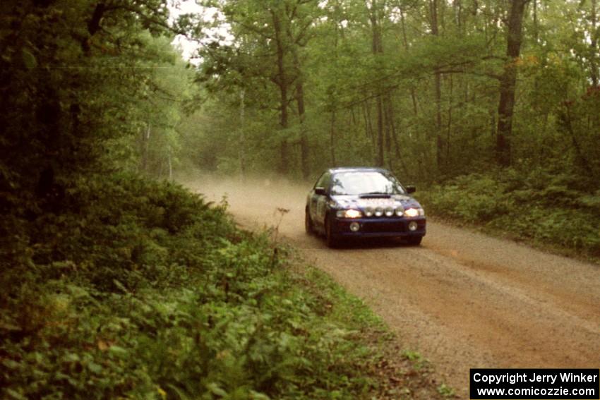 Kazimierz Pudelek / Mariusz Malik Subaru Impreza at speed on SS2.