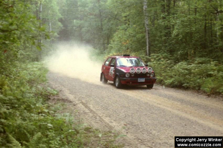 Karl Biewald / Scott Parrott VW GTI at speed on SS2.