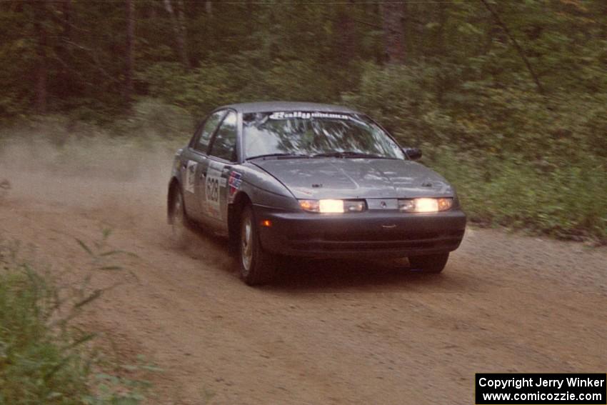 Dan Adamson / Chris Gordon Saturn SL2 at the finish of SS2.