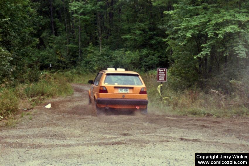 Chad Eixenberger / Jay Luikart VW Golf exit a hairpin on SS3.