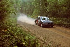 Evan Cline / Tracy Manspeaker in their Mitsubishi Galant GSX on SS2.