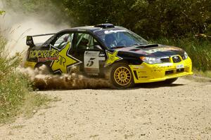 Andy Pinker / Robbie Durant Subaru WRX STi prepare for a hard left on SS9.