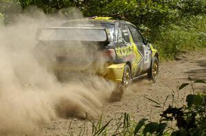 Andy Pinker / Robbie Durant Subaru WRX STi powers out of corner on SS9.