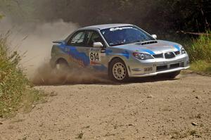 Piotr Wiktorczyk / Martin Brady prepare for a 90-left in their Subaru WRX on SS9.