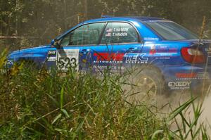 Travis Hanson / Terry Hanson Subaru Impreza WRX take a 90-left on SS9.