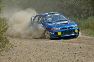 Dmitri Kishkarev / Hugh Hutchinson Mitsubishi Lancer Evo 4 on SS6.