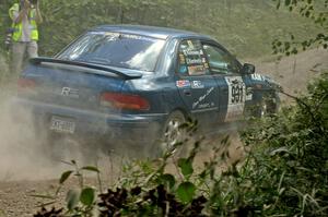 Don Kennedy / Matt Kennedy Subaru Impreza fly through a 90-left on SS9.