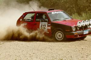 Karl Biewald / Scott Parrott VW GTI slings gravel on SS9 (1).