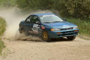 Martin Mennig / Ryan Schnell Subaru Impreza at the SS9 spectator point (1).