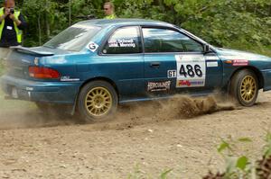 Martin Mennig / Ryan Schnell Subaru Impreza at the SS9 spectator point (2).